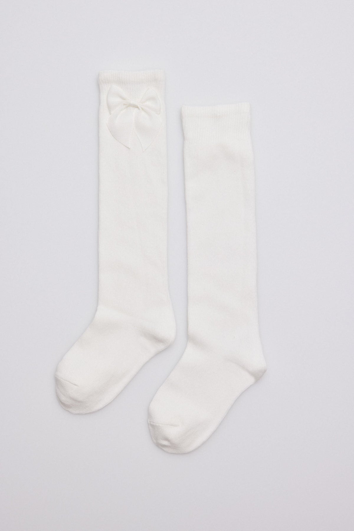 02820-1-calcetines-largos-infantil-lazo-ysabel-mora - Marfil