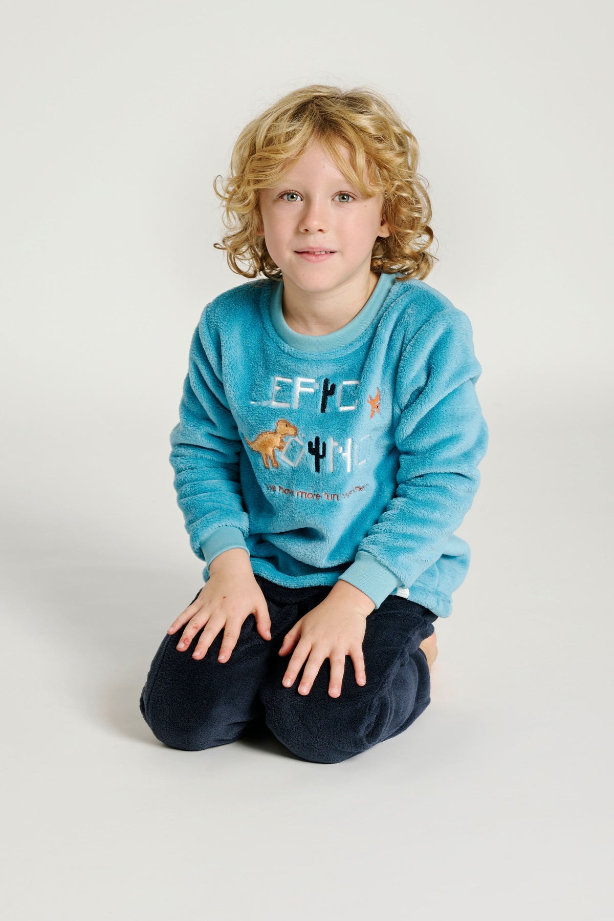 17011010-1-piijama-infantil-pelo-dinosaurios-azul