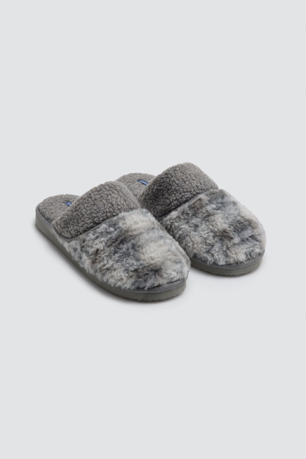 Chaussons homme contrastés effet mouton et fourrure
