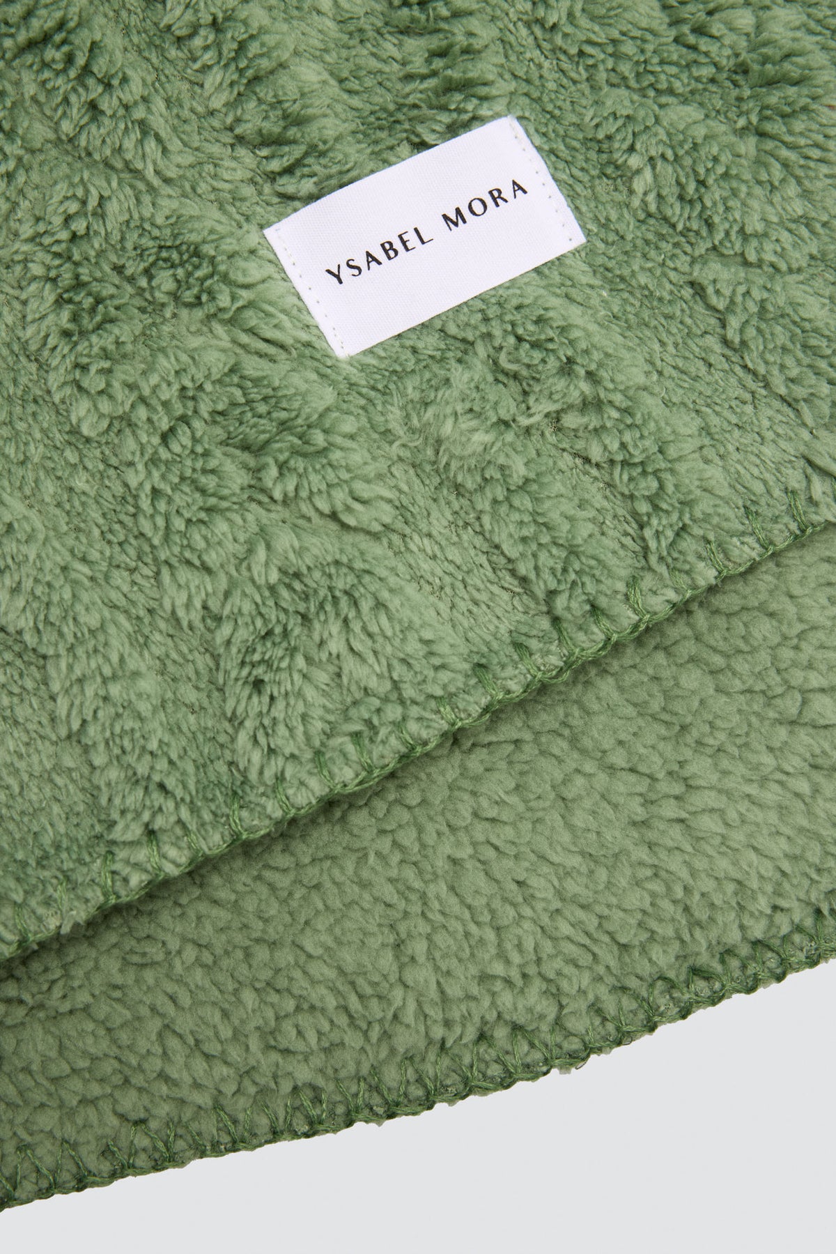 Plaid texturé vert effet mouton