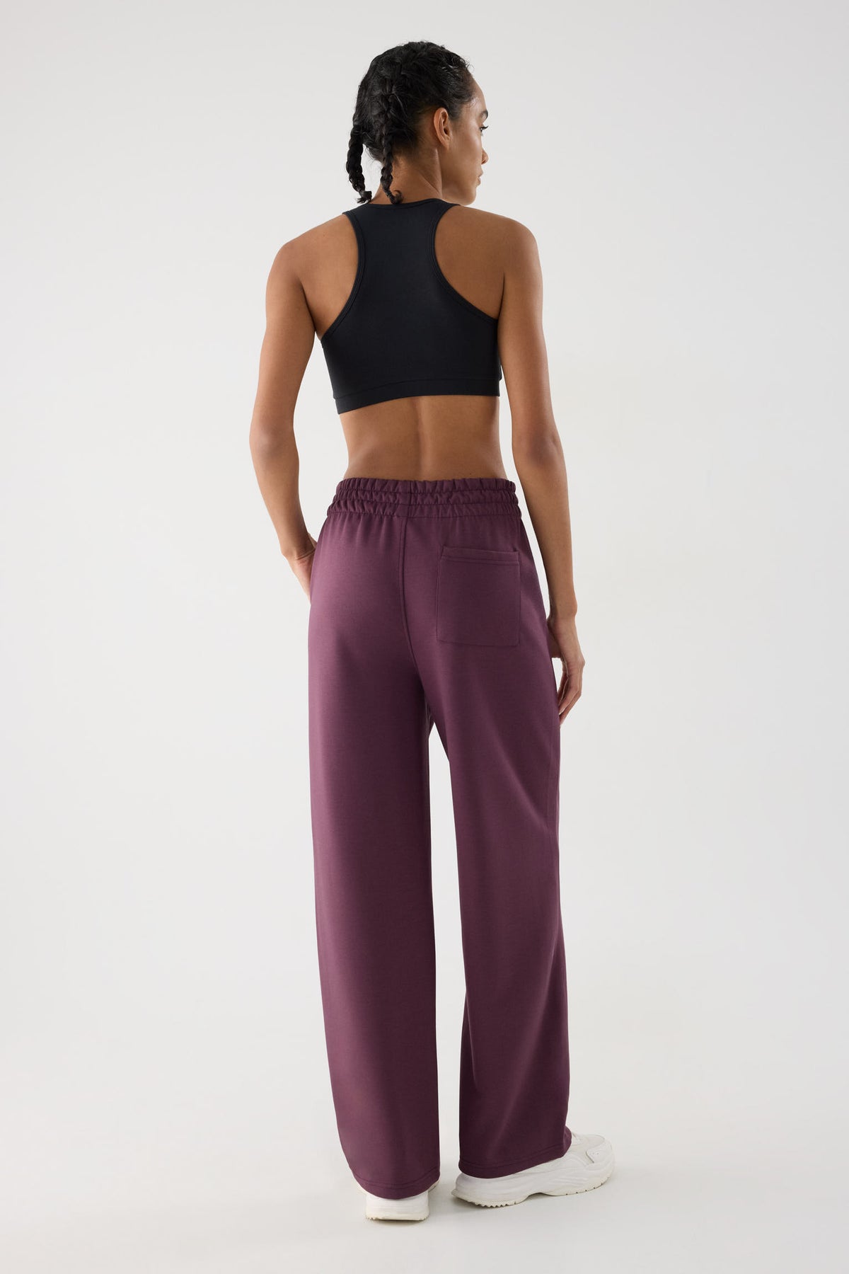 pantalón deportivo mujer Slowloom en granate cherry lacquer vista en movimiento para entrenamientos tejido suave para conjunto comfy