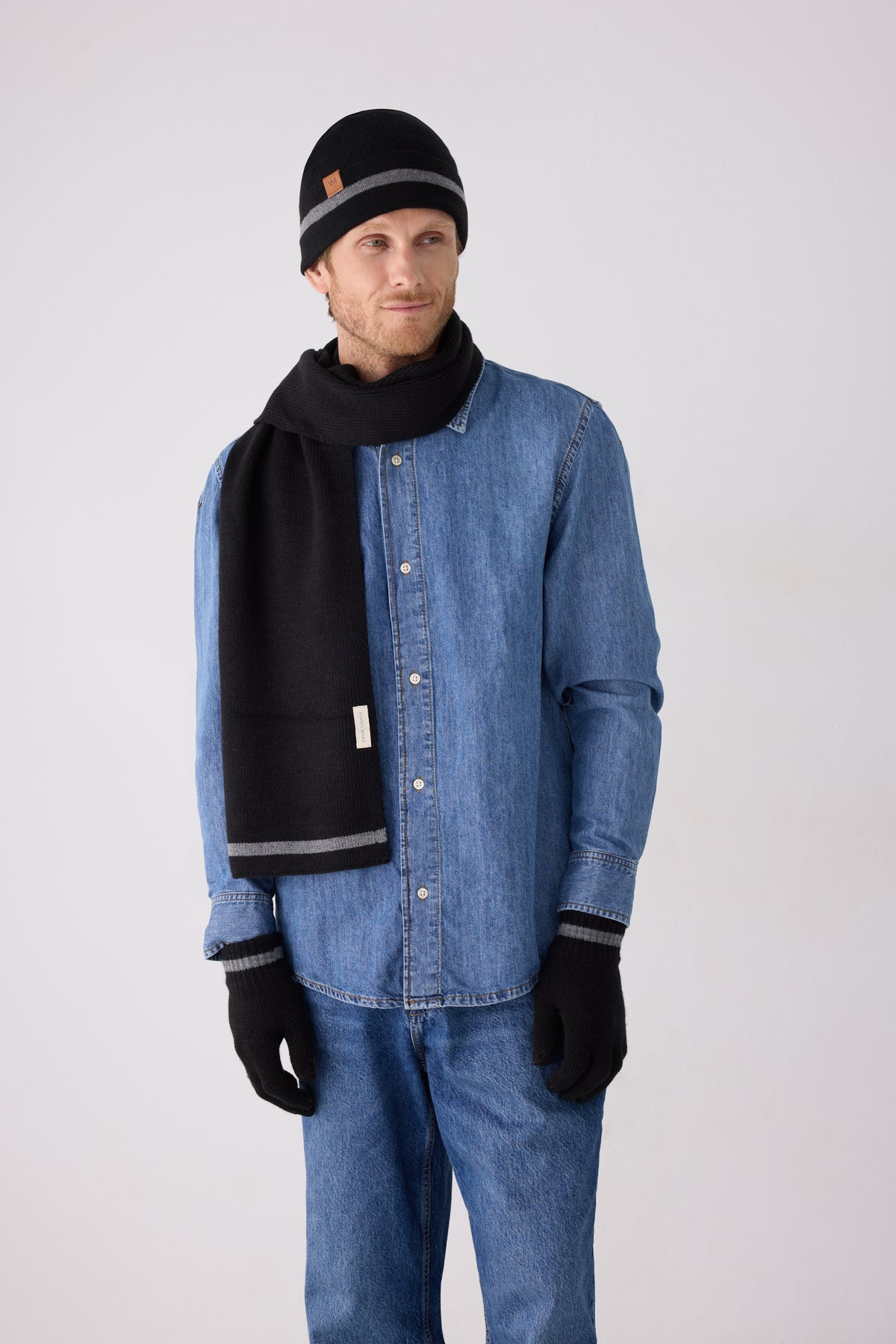 Bonnet homme en maille rayée noir avec doublure polaire