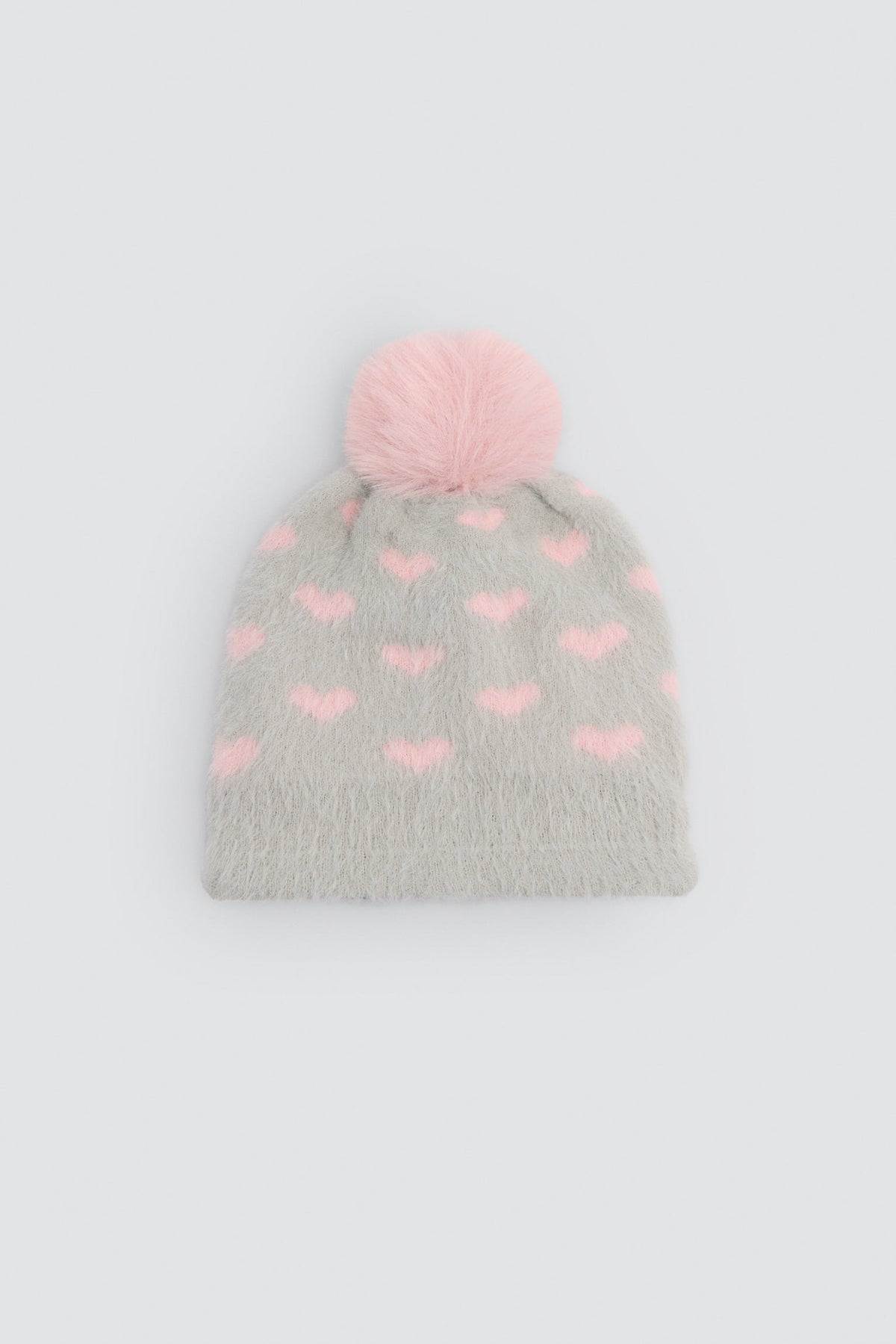 Bonnet fille à pompon avec doublure polaire et imprimé cœurs