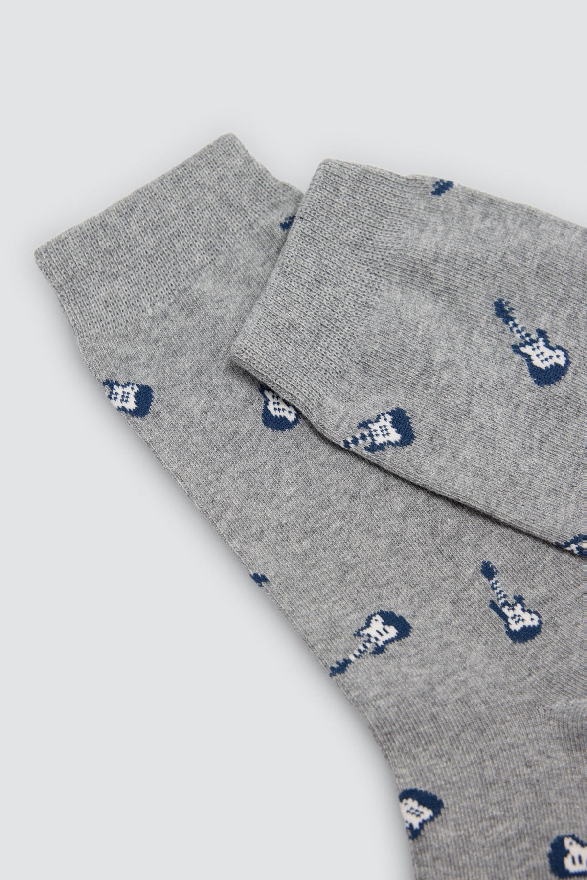 Lot de 4 chaussettes imprimé animaux, guitares et fusées