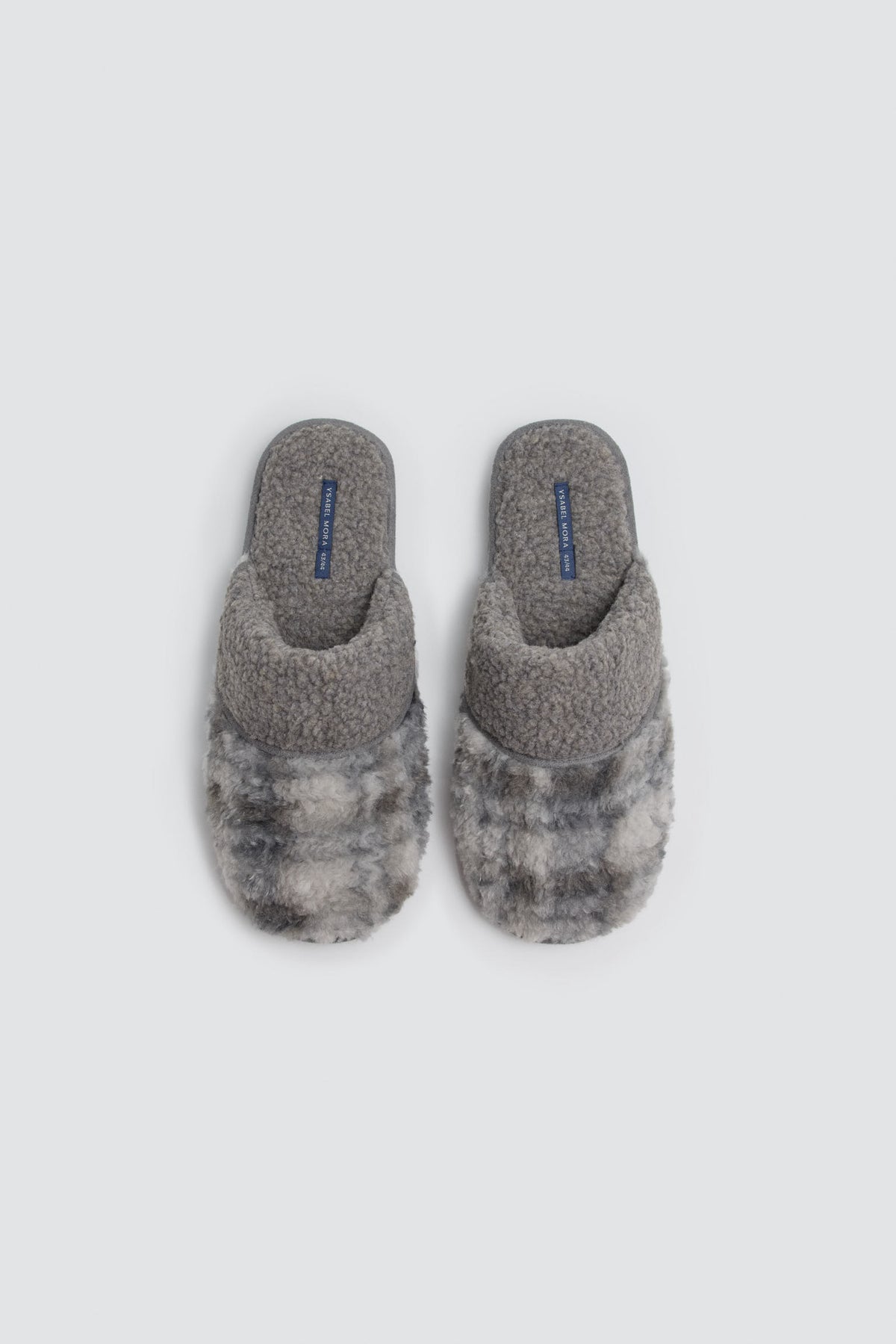 Chaussons homme contrastés effet mouton et fourrure