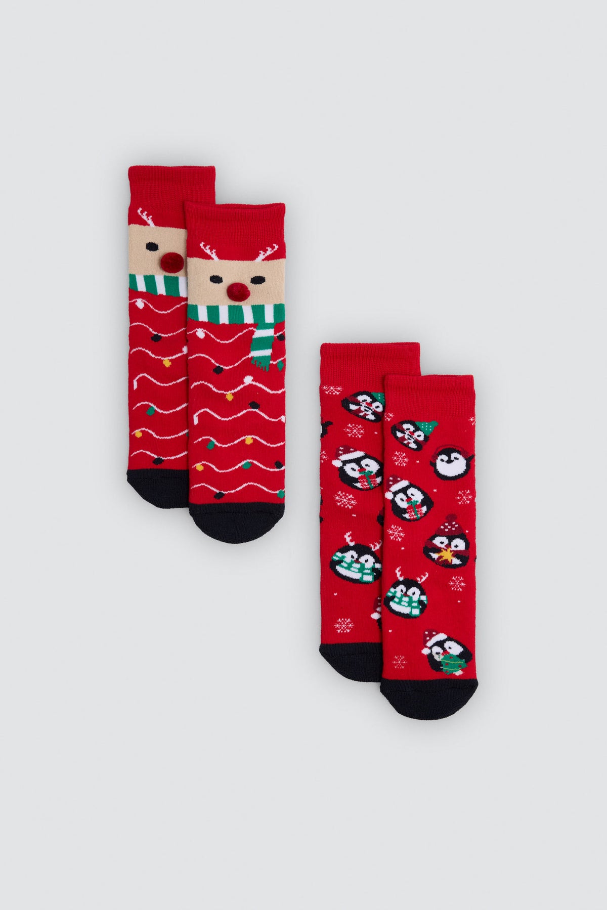 Lot de 2 chaussettes enfant de Noël avec rennes et pingouins