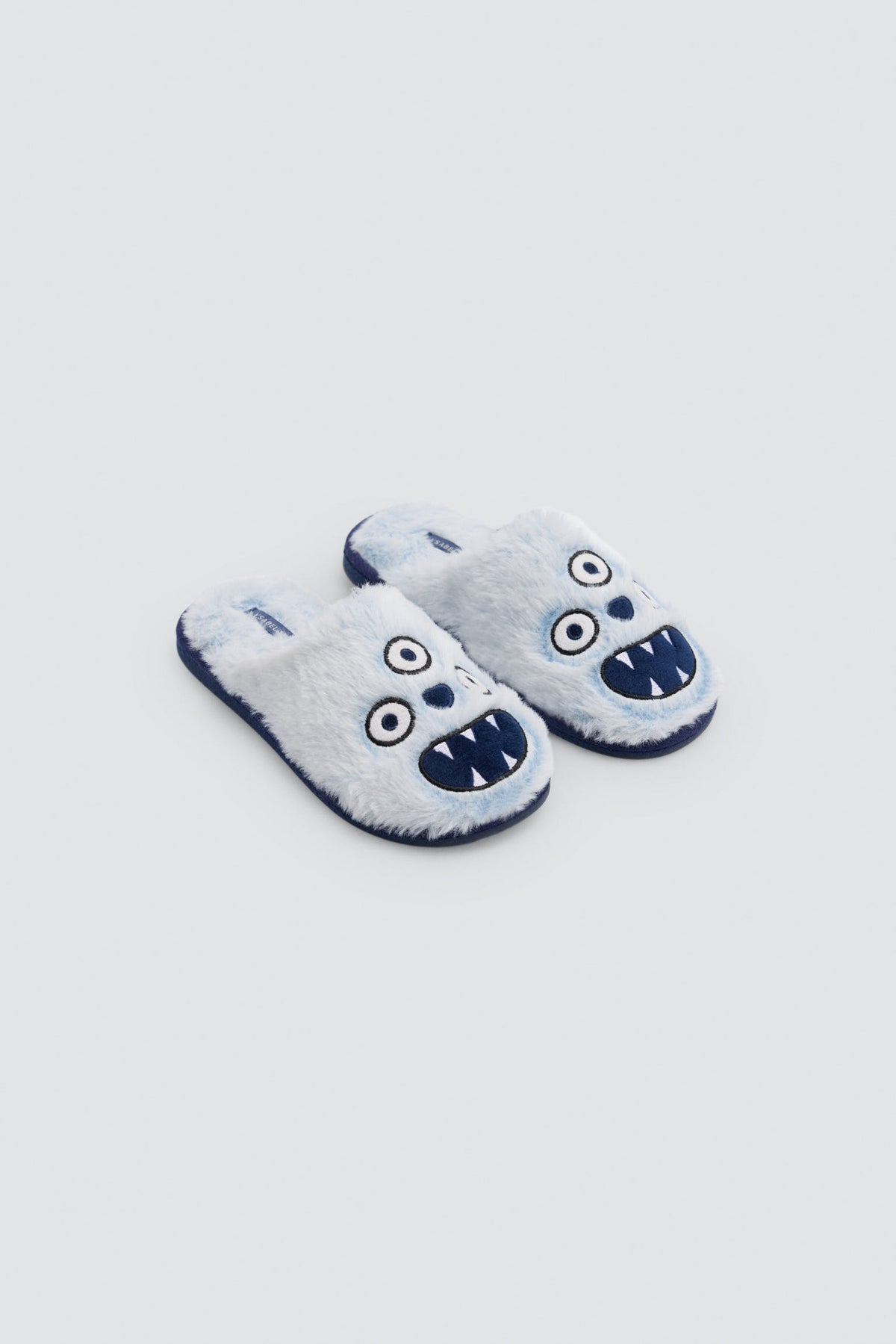 Chaussons garçon en fourrure motif monstre