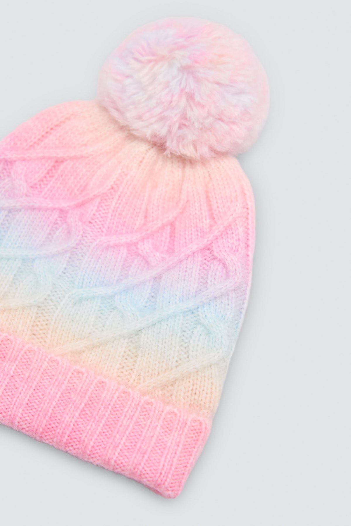 Bonnet fille en maille multicolore à pompon avec doublure polaire