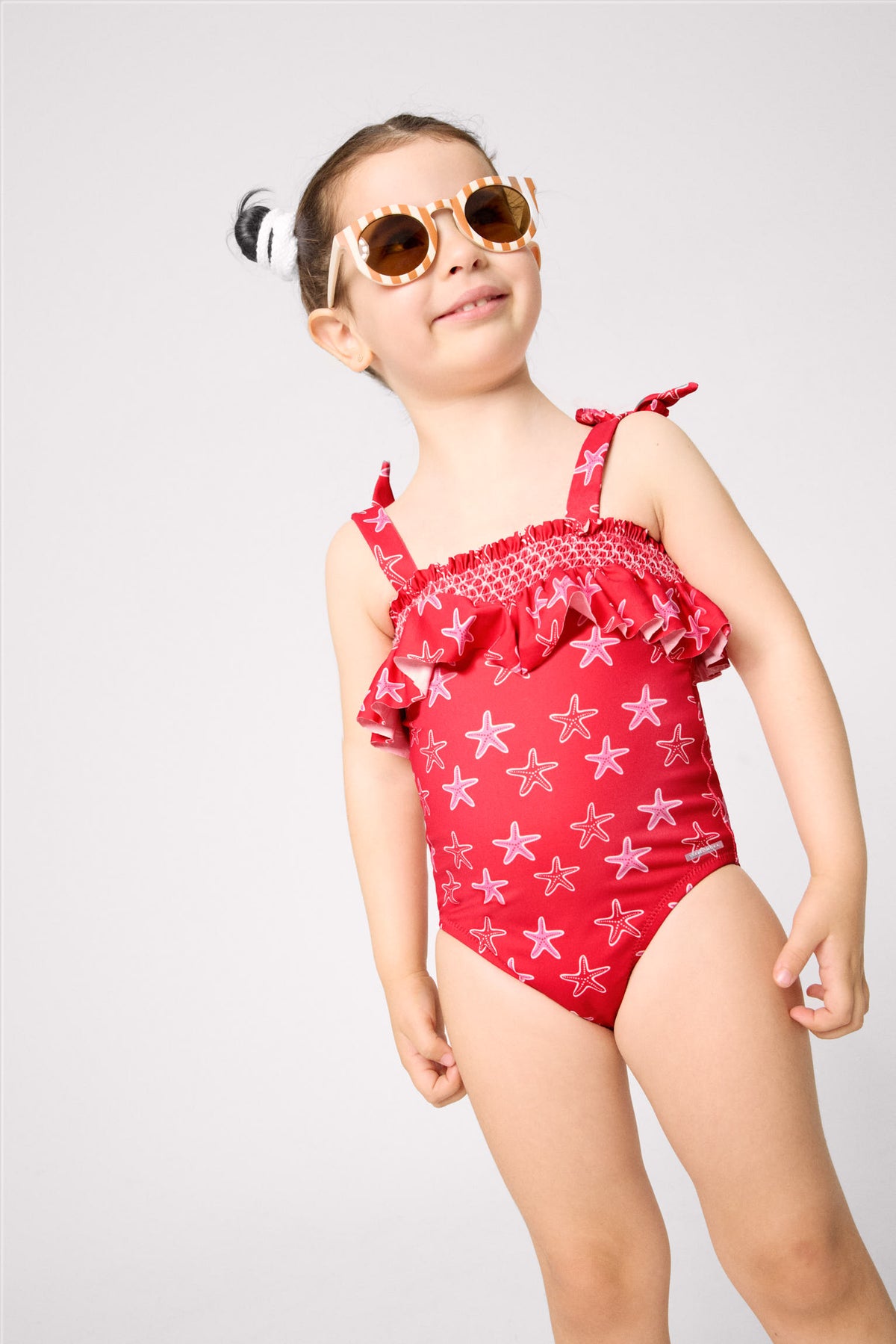 Bañador niña detalle volante estampado estrellas marinas - Ysabel Mora