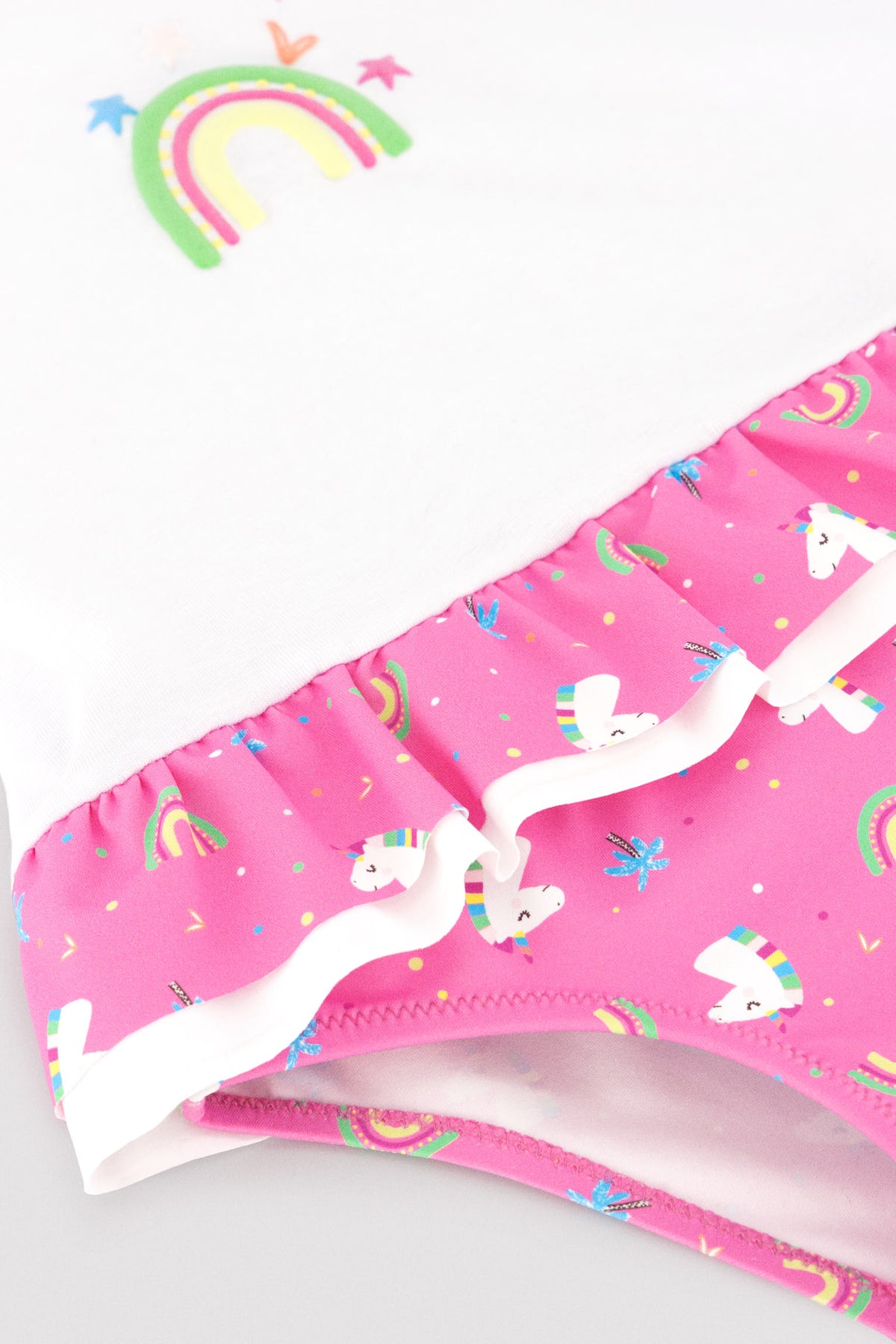Conjunto bebé camiseta y braguita baño detalles  volantes y lazos estampado unicornios - Ysabel Mora
