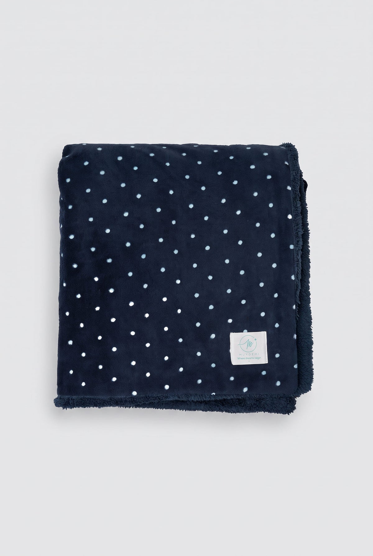 Plaid bleu marine à pois en polaire corail et effet mouton